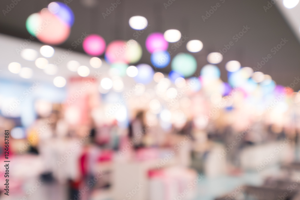 Obraz premium abstract bokeh in night shopping mall for background