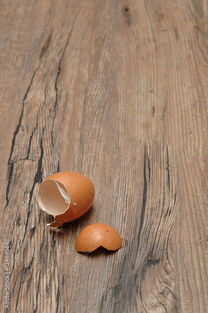 Egg shells on a wooden table Egg shells on a wooden table