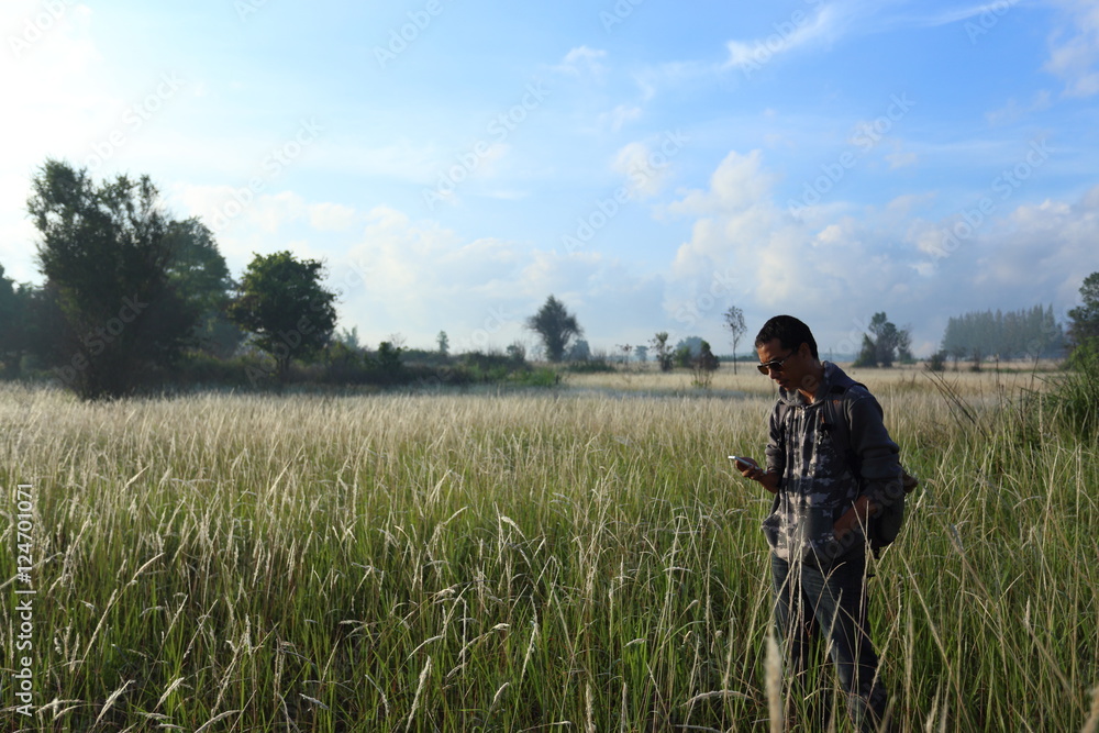 Man and White field grass flower at Thailand Man and White field grass flower at Thailand