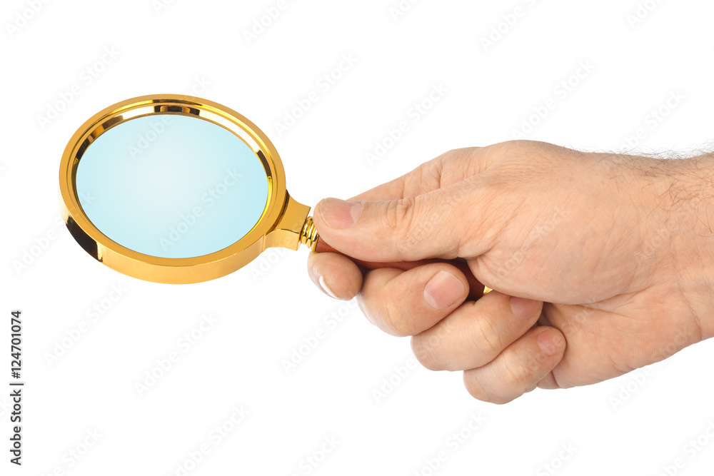 Fototapeta premium Magnifying glass in hand