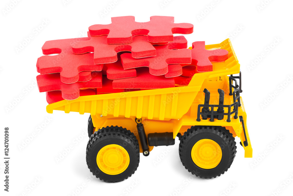 Obraz premium Toy truck with puzzle