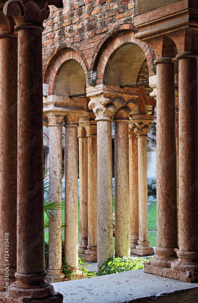 Columns and arches in the medieval cloister of Saint Zeno. Verona, Italy - HDR Columns and arches in the medieval cloister of Saint Zeno. Verona, Italy - HDR