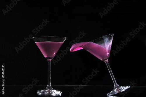 glasses of colored water / pair of cocktail glasses with colored water