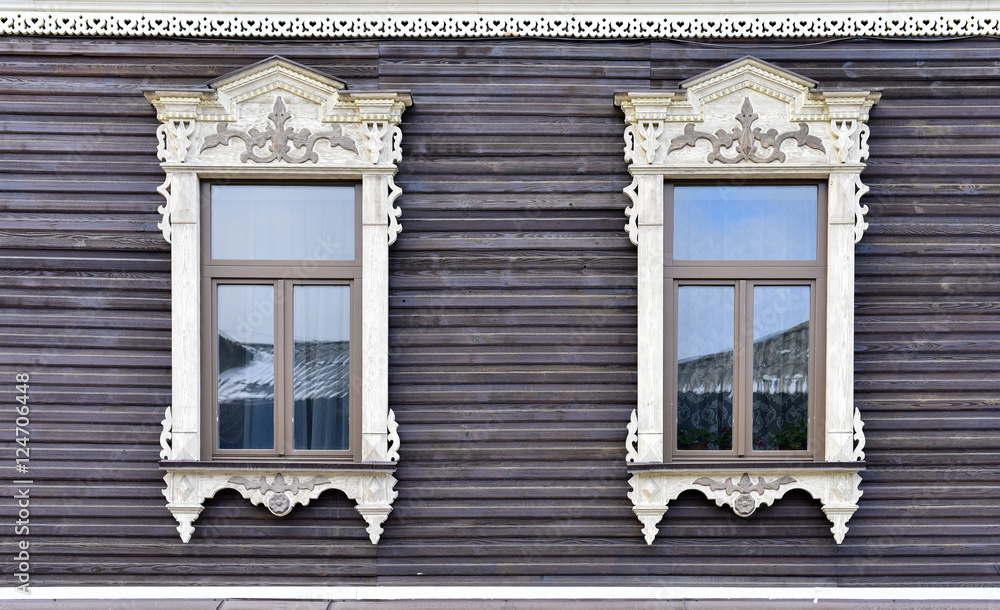 Wooden decorating of windows old residential buildings