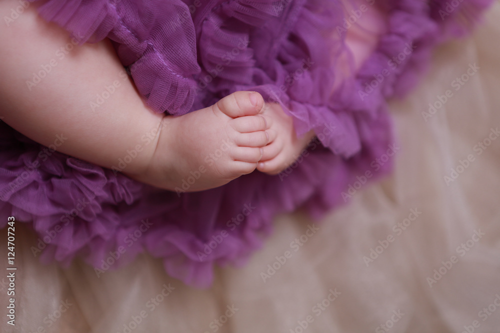 Fototapeta premium The feet of a newborn baby