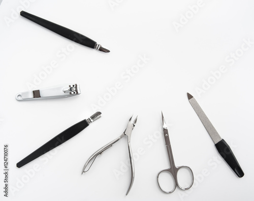 manicure instruments set on white background top view