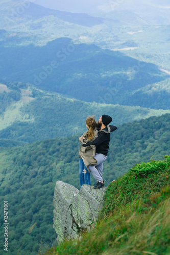 Romantic couple on mountain top