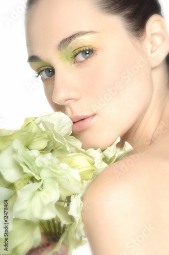 portrait of beautiful woman with flower
