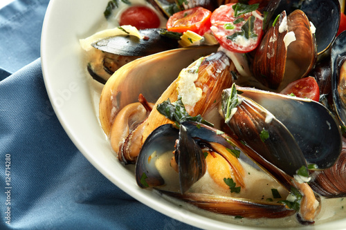 Plate of mussels in garlic sauce