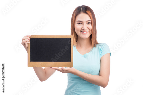 Young asian student woman holding a chalkboard isolated on white