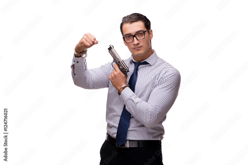 Young businessman with gun isolated on white Young businessman with gun isolated on white