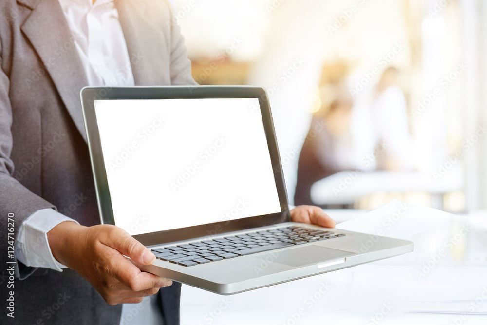Business man showing blank screen on a laptop. for Presentation Concept. Business man showing blank screen on a laptop. for Presentation Concept.