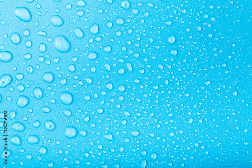 Drops of water on a color background. Toned