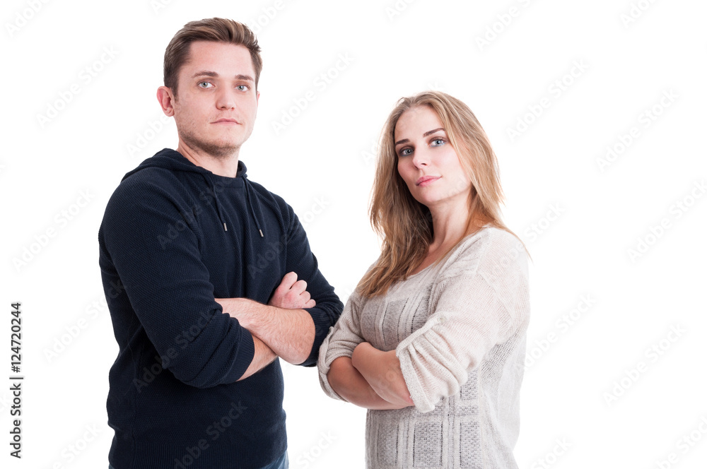 Couple posing and standing with arms crossed Couple posing and standing with arms crossed