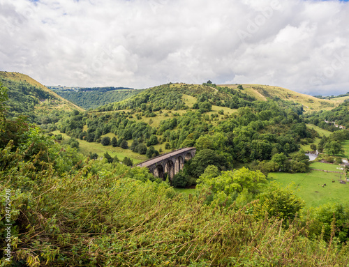 View of the old railway viaduct on the Monsal Trail, Peak District, UK photo