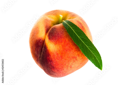 Peach with leaf isolated on white