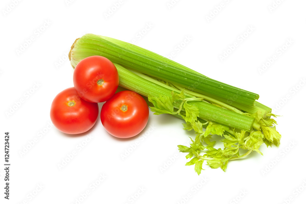 celery and ripe tomatoes isolated on white background celery and ripe tomatoes isolated on white background
