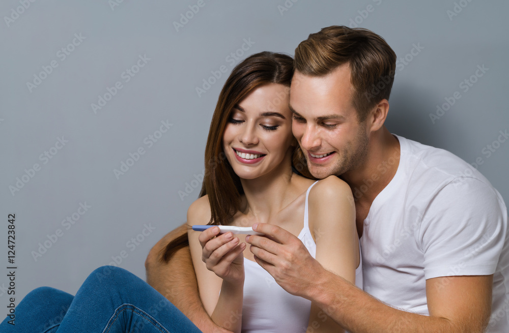 Couple, finding out results of a pregnancy test Couple, finding out results of a pregnancy test