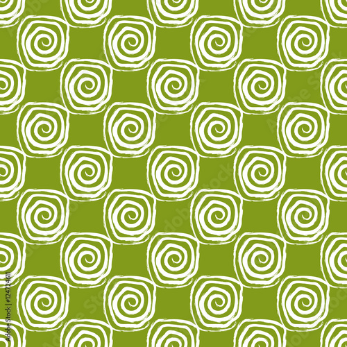 Pattern of white spirals on a green background