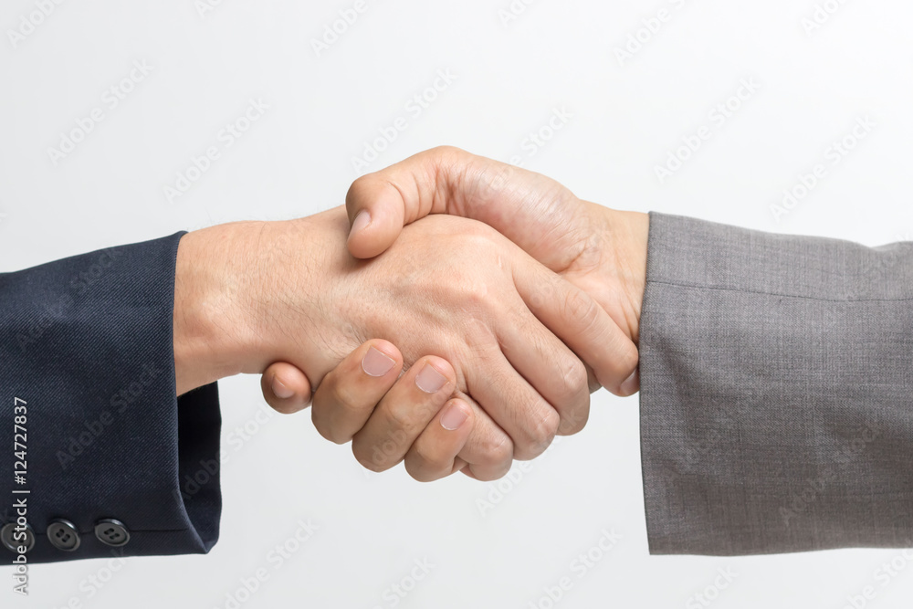 Obraz premium Two business people handshake.