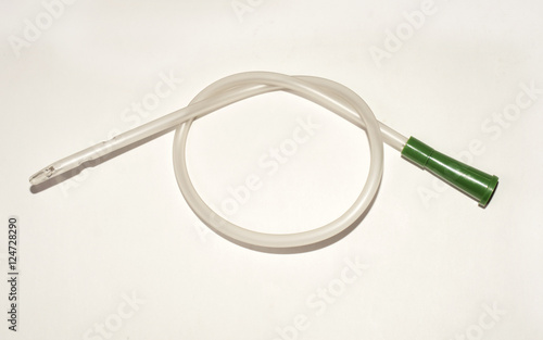 an intermittent transparent catheter isolated over a white backg