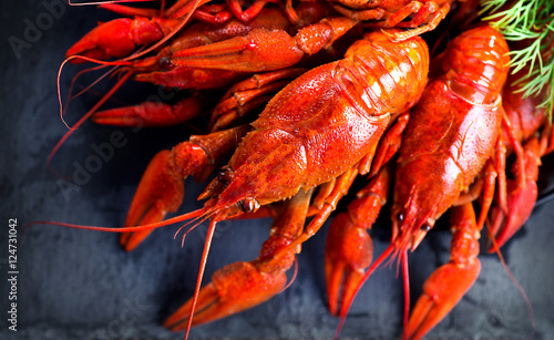 Red boiled crayfish or crawfish with lemon and herbs