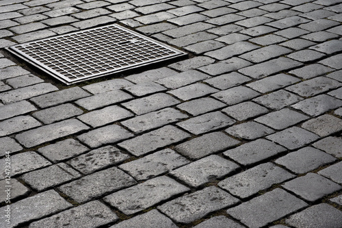 Stone pavement texture. Photo taken in Prague. Pavement in the streets of Prague