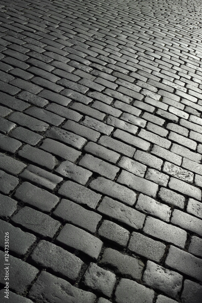Stone pavement texture. Photo taken in Prague. Pavement in the streets of Prague