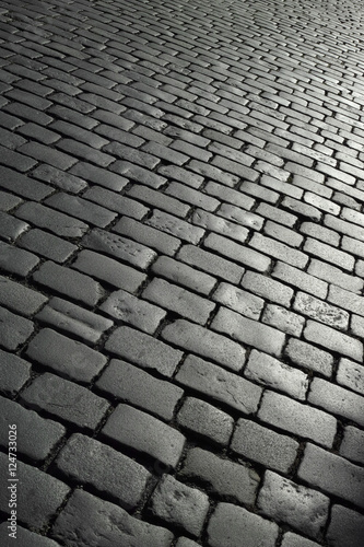 Stone pavement texture. Photo taken in Prague. Pavement in the streets of Prague