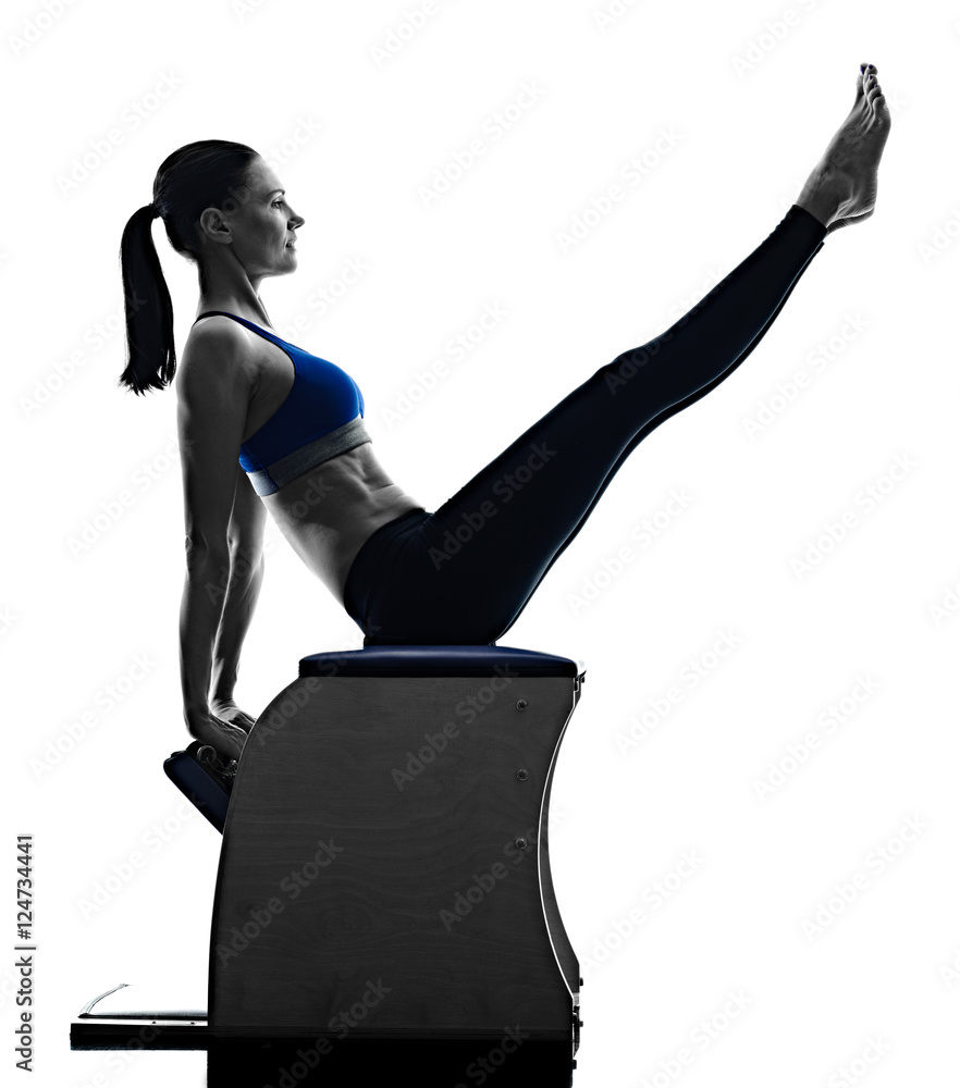 Premium Photo  Determined woman exercising on wunda chair