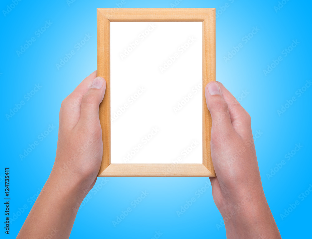 Young female hands holding photo frame Young female hands holding photo frame