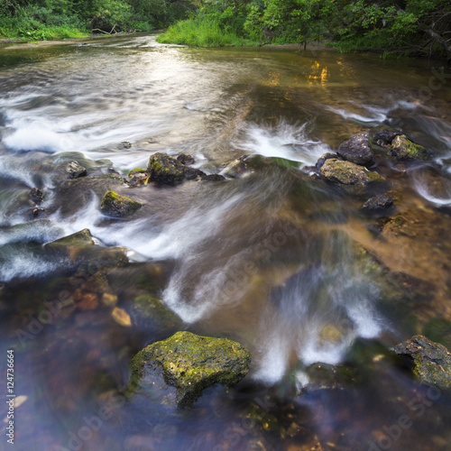 The runnig Water and the Stones photo