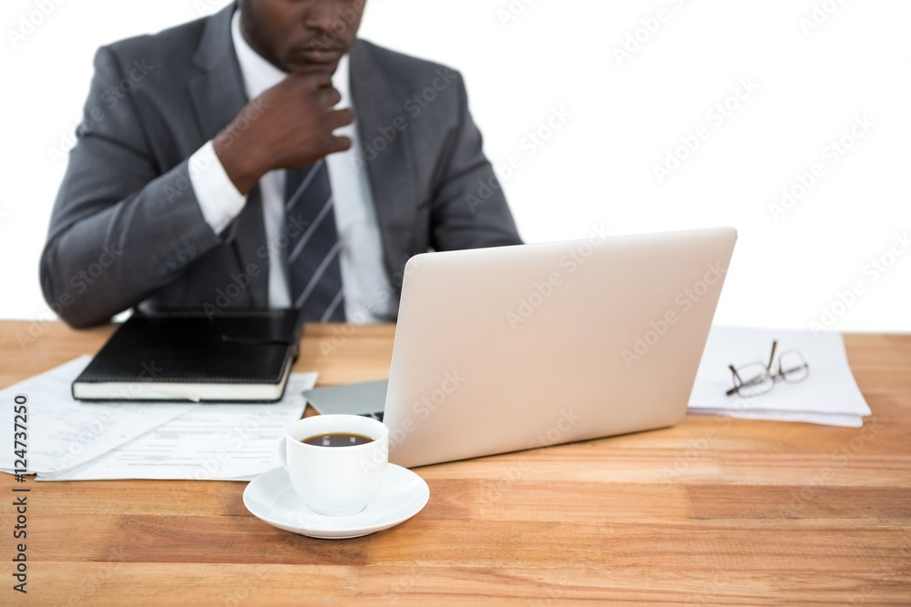 Businessman working on laptop Businessman working on laptop