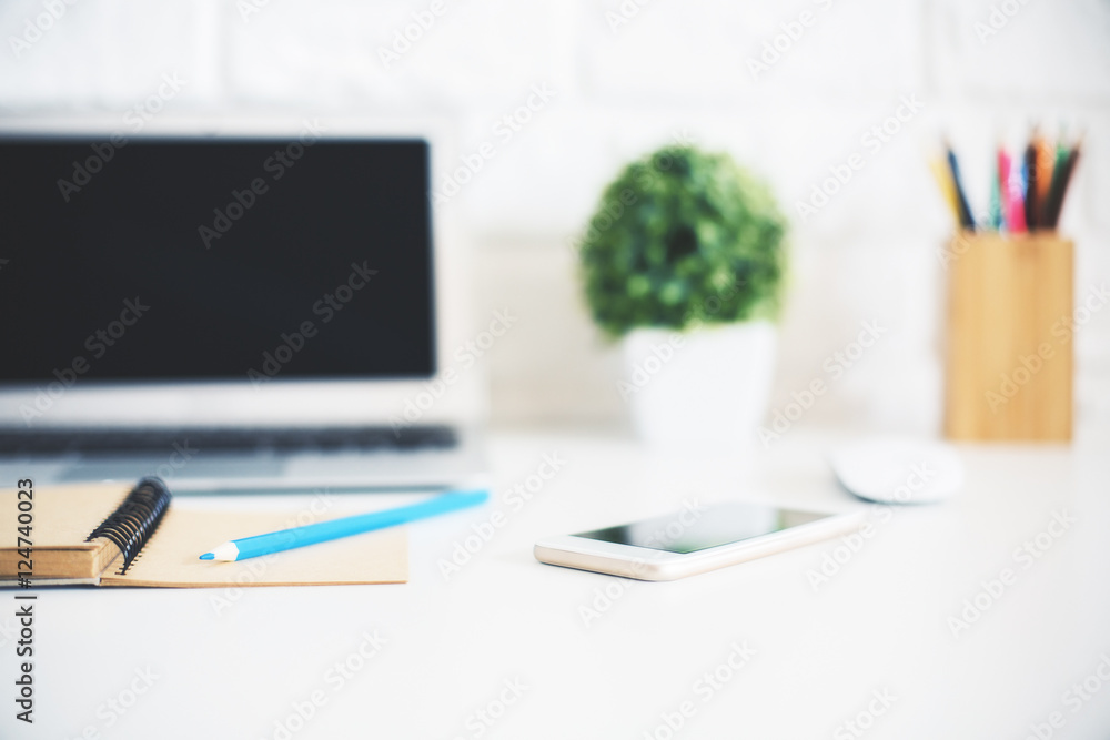 Workplace with blurry notebook Workplace with blurry notebook