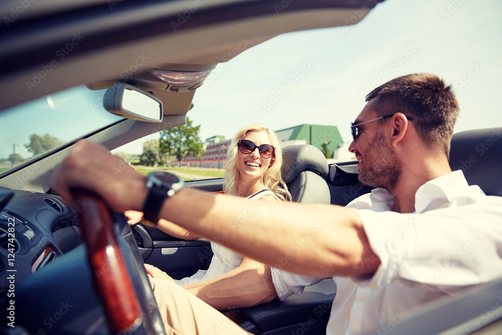 happy man and woman driving in cabriolet car happy man and woman driving in cabriolet car