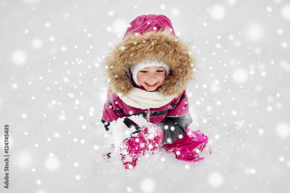 f happy little child or girl with snow in winter f happy little child or girl with snow in winter