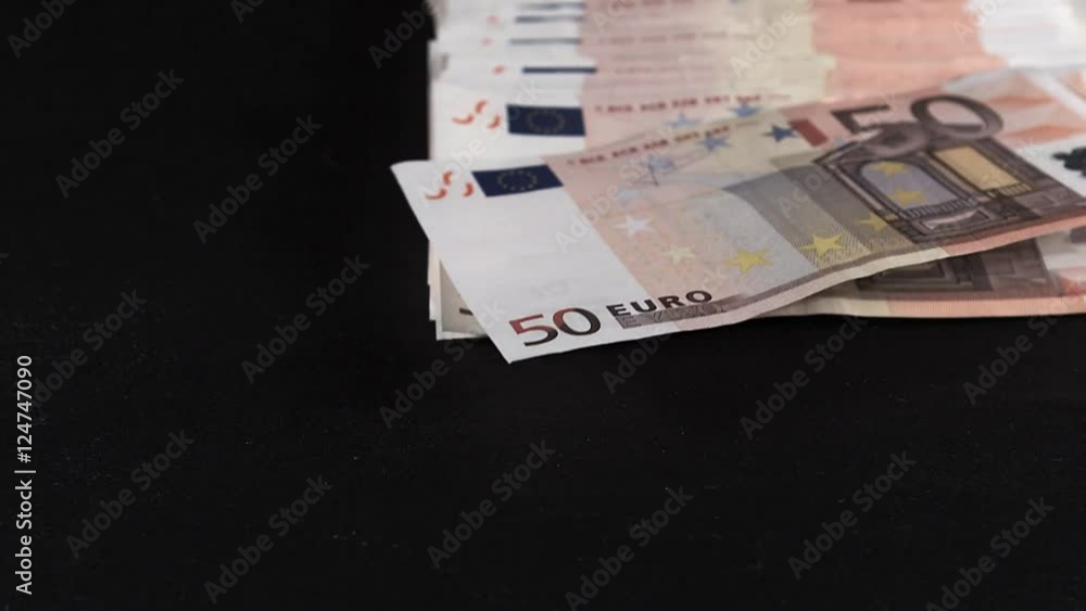50 euros money falling against black background, Slow motion 50 euros money falling against black background, Slow motion