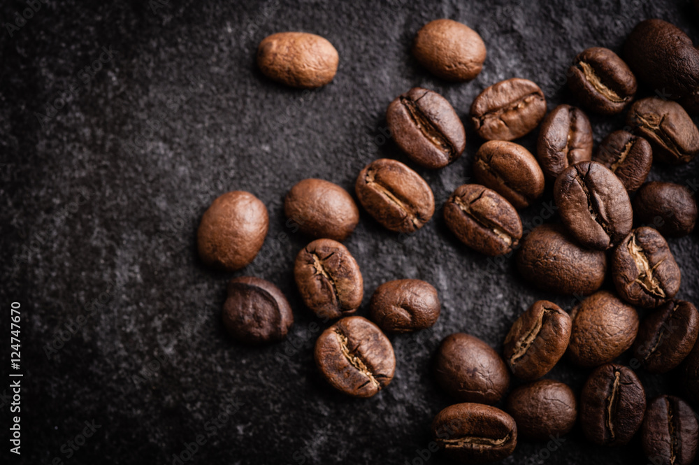 roasted coffee beans on dark background, can be used as a background roasted coffee beans on dark background, can be used as a background