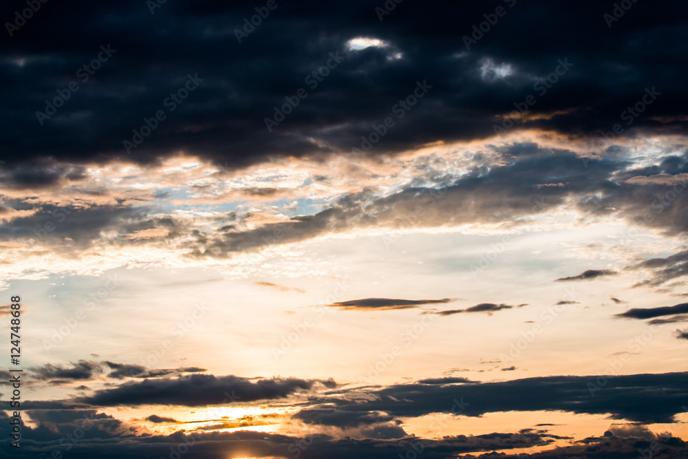 colorful dramatic sky with cloud at sunset