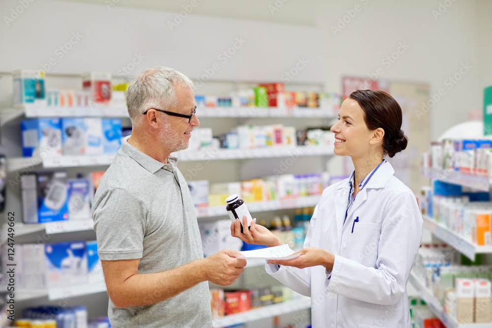 pharmacist and senior man buying drug at pharmacy