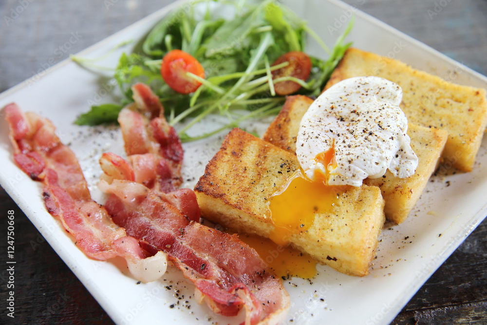 egg benedict with bacon on wood background , breakfast egg benedict with bacon on wood background , breakfast