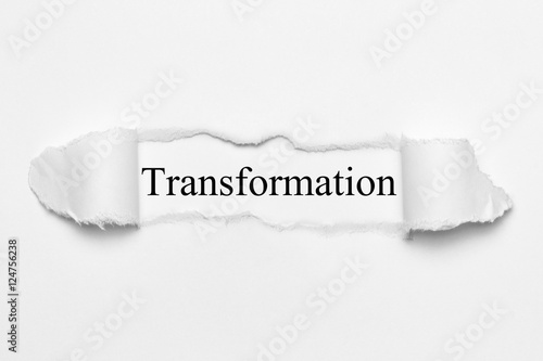 Transformation on white torn paper photo