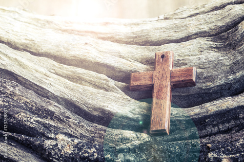 Photography The wooden cross on old  wooden background
