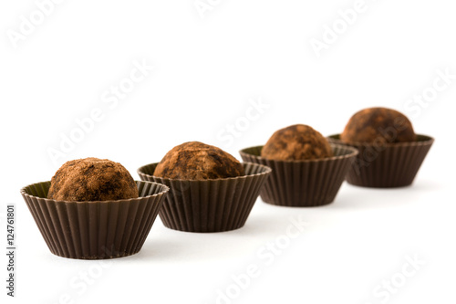 Homemade chocolate truffles isolated on white background

