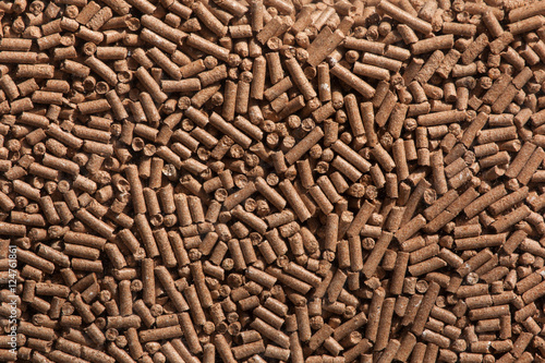 Photos Animal food pellets. Background texture