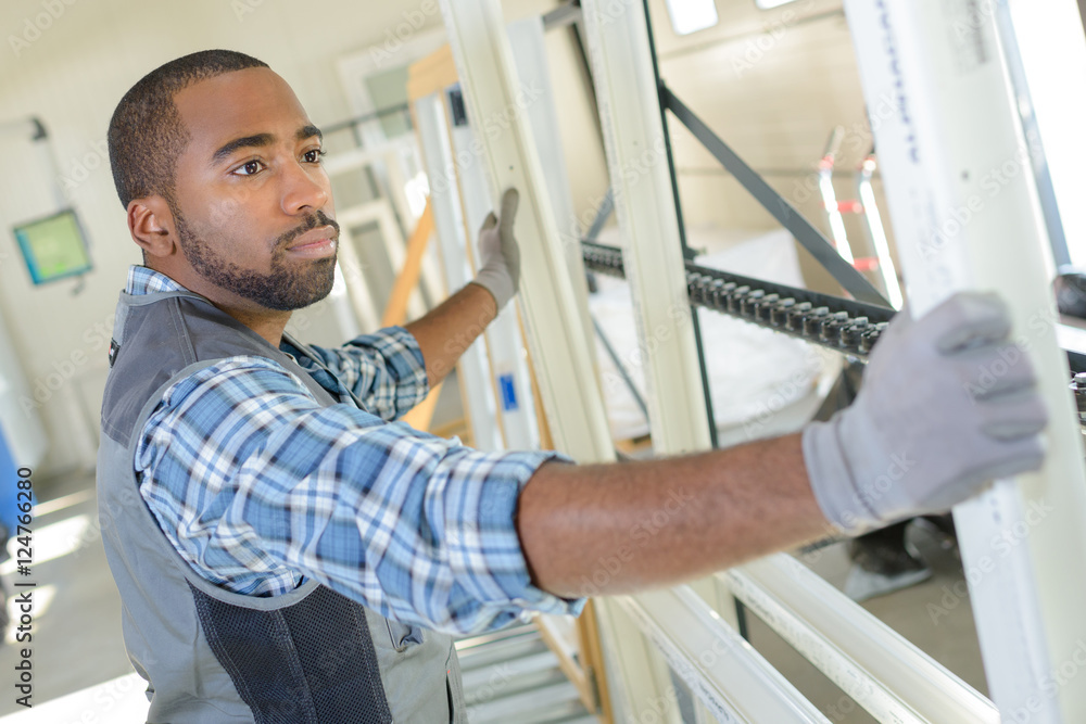 Man manufacturing upvc windows Man manufacturing upvc windows