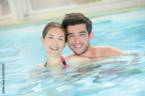 Couple in swimming pool © auremar