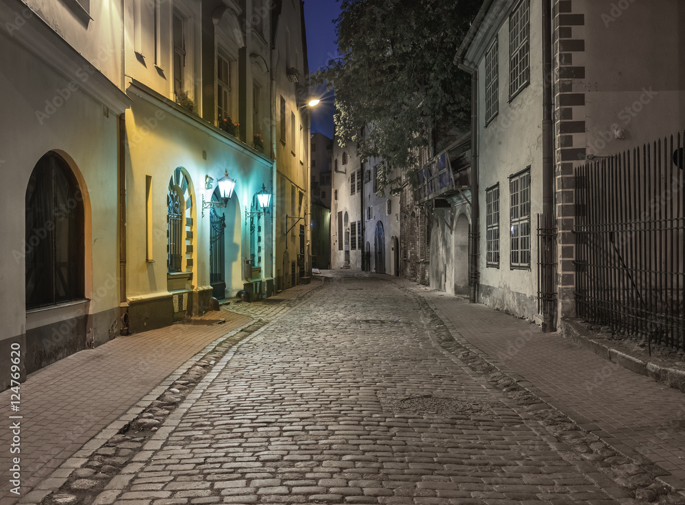 Night in old city of Riga, Latvia. Image slightly toned for inspiration of retro style
