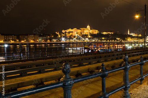 Buda Castle in lights, night photo of Budapest with Danube, Hung