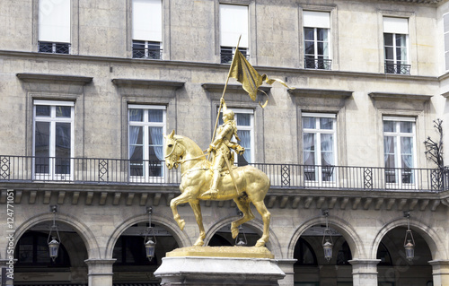 The golden statue of Saint Joan of Arc in Paris, France. photo